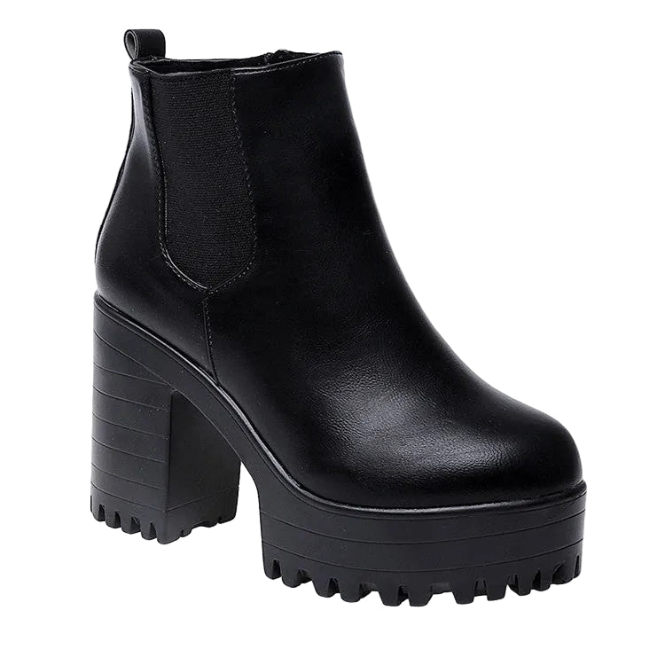 Black platform ankle boot on a white background