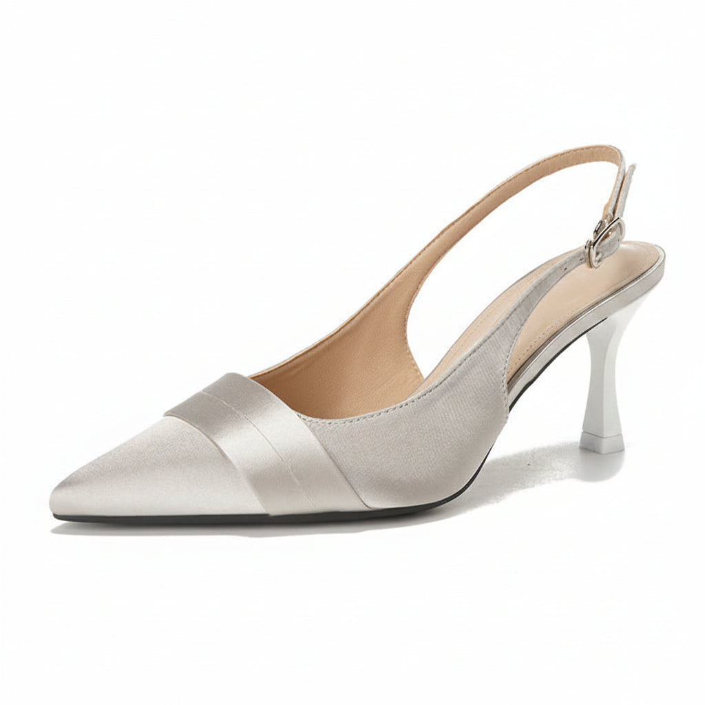 Silver high-heeled shoe on a white background